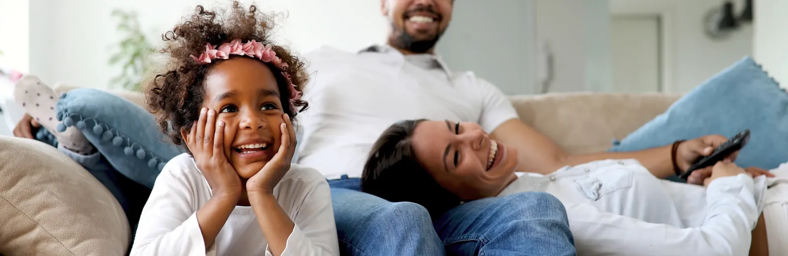 family-on-couch-laughing