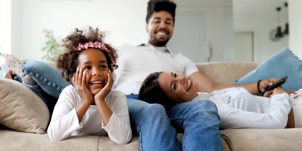 family-on-couch-laughing