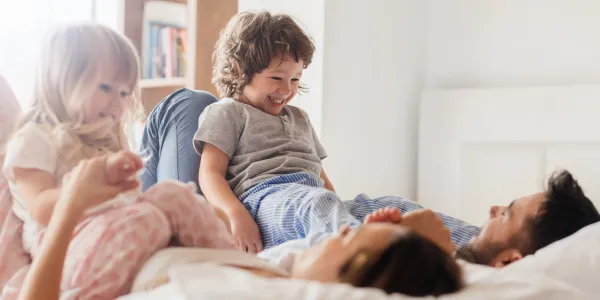 family in bed