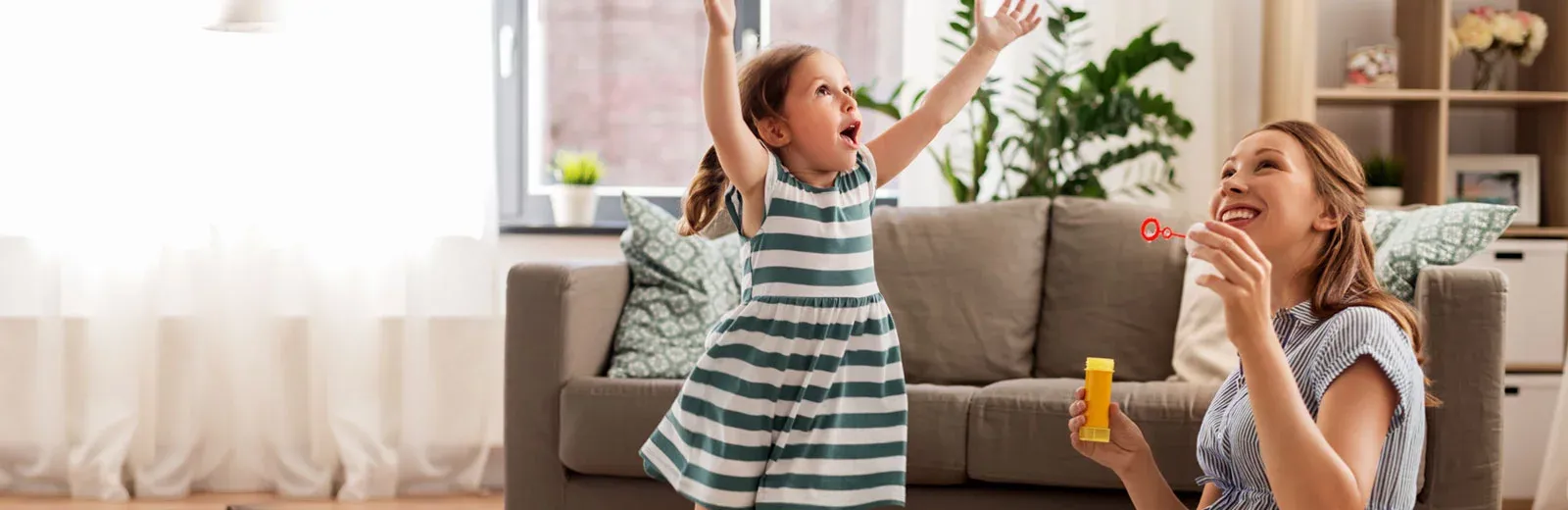 Family playing indoors in a pest-free home